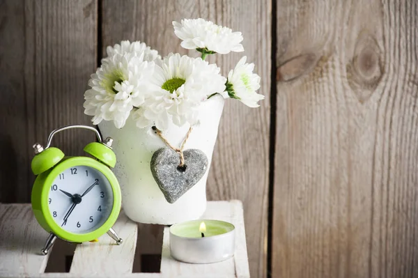 Flowers Alarm Clock Lit Candle Copy Space — Stock Photo, Image