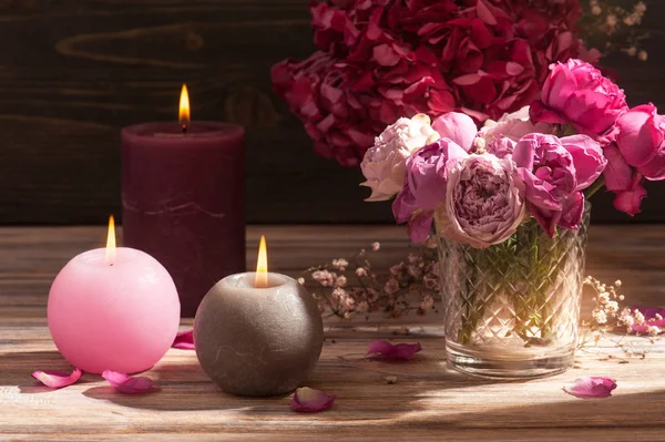 Red hydrangea flowers and pink roses