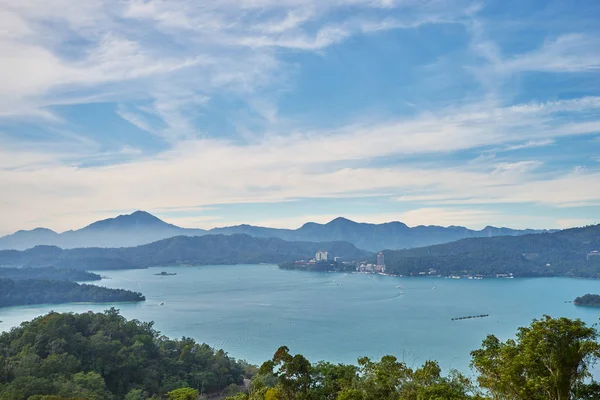 Beautiful nature scenics of Sun Moon Lake with the surrounding mountains are the highlight at this sprawling lake at Yuchi, Nantou in Taiwan.