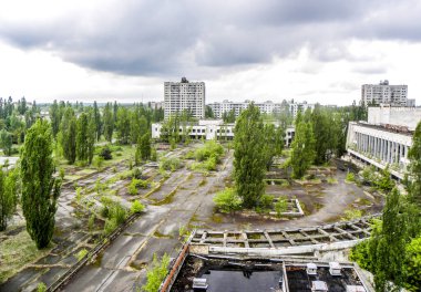 View from roof top in Hotel Polissya in central Pripyat in Chernobyl area in Ukraine clipart