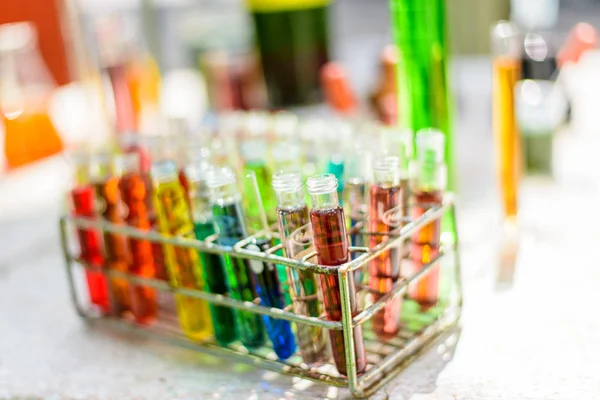 Colorful water in test tube in lab