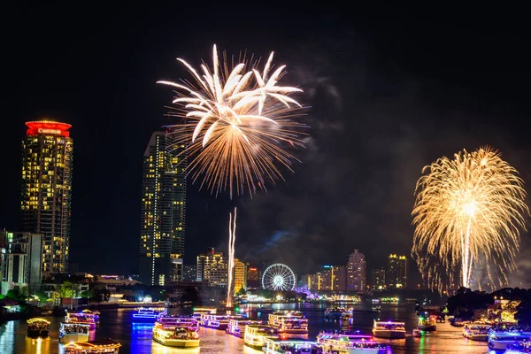 Fireworks at the river of city in New Year countdown time