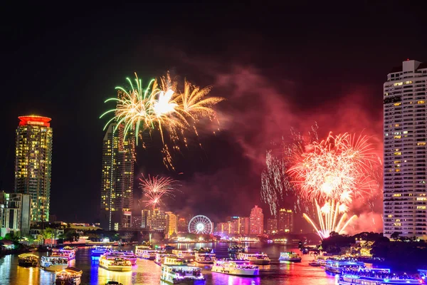 Fireworks at the river of city in New Year countdown time