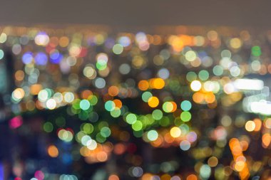 Şehrin yüksek görünümü bulanıklık ışığı / Şehirde yüksek bina Bokeh ışık