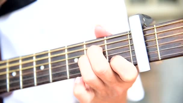 Musician Playing Finger Style Acoustic Guitar Capo — Stock Video