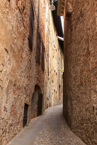 Empty narrow medieval street in Bergamo, Lombardy, Italy