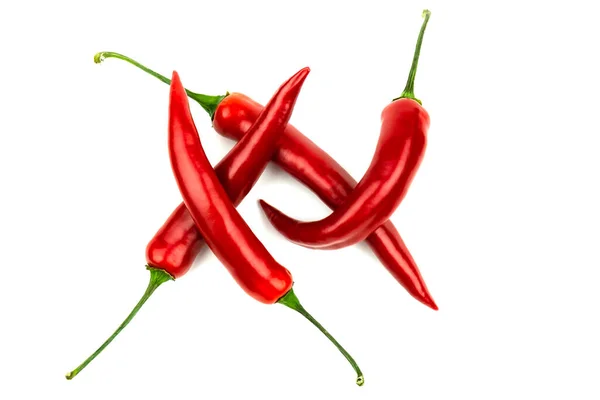 Mehrere Rote Paprika Auf Weißem Hintergrund — Stockfoto