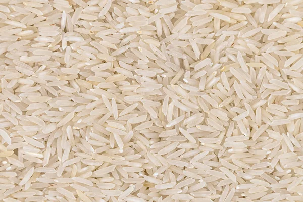 Büyük pirinç taneleri serpilmiş. Düz ekran görüntüsü.