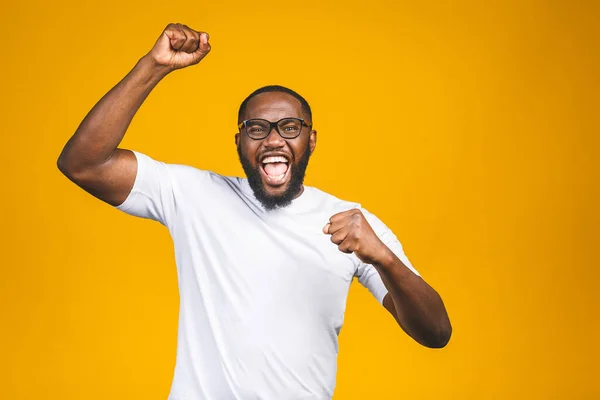 stock image Portrait of excited young African American male screaming in shock and amazement. Surprised man looking impressed, can't believe his own luck and success