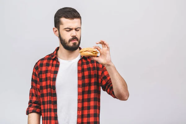 Hamburger Tutan Genç Bir Adam Öğrenci Fast Food Yiyor Burger — Stok fotoğraf