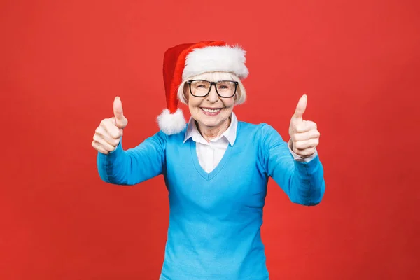 Senior Aged Grey Haired Woman Wearing Christmas Santa Hat Isolated — Stock Photo, Image