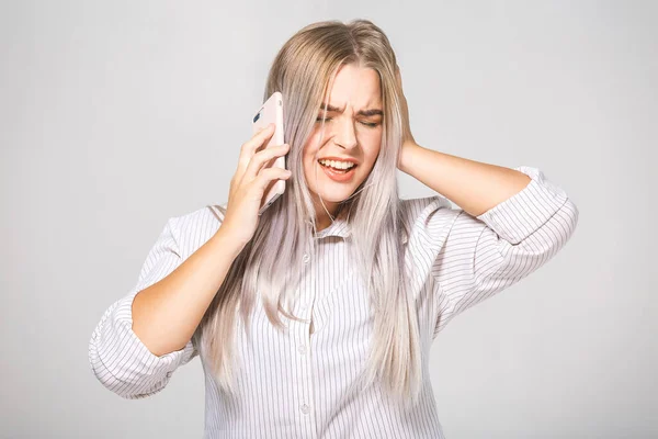 Angry beautiful woman boss shouting with phone. Isolated portrait on white background. Isolated.