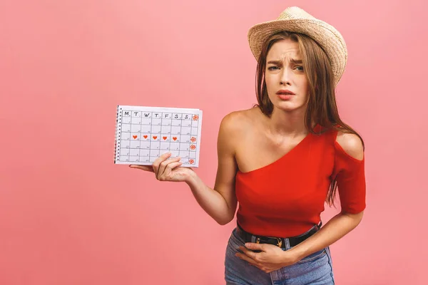 Retrato Uma Menina Engraçada Segurando Calendário Períodos Isolados Sobre Fundo — Fotografia de Stock