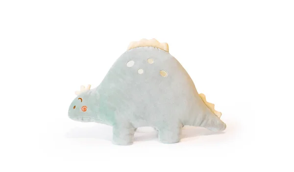 Soft light green Stegosaurus dinosaur plushie toy isolated on white background with shadow reflection. The concept of gifts for the holidays. Toy in the shape of an animal. Side wiew — Stock Photo, Image