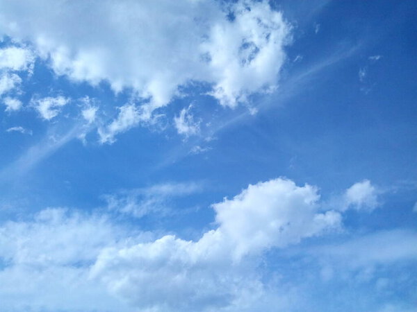 clouds in the blue sky on a sunny summer day