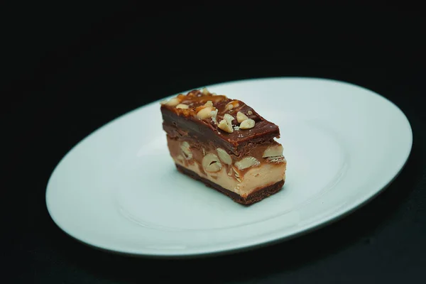 Brownie Cake Piece Peanuts White Plate — Stock Photo, Image