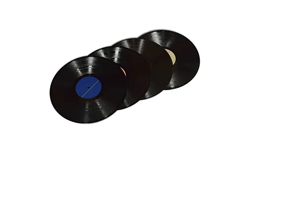 白い背景に隔離されたいくつかの古いレコード — ストック写真