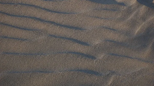 Forme Sabbia Uno Sfondo Spiaggia — Foto Stock