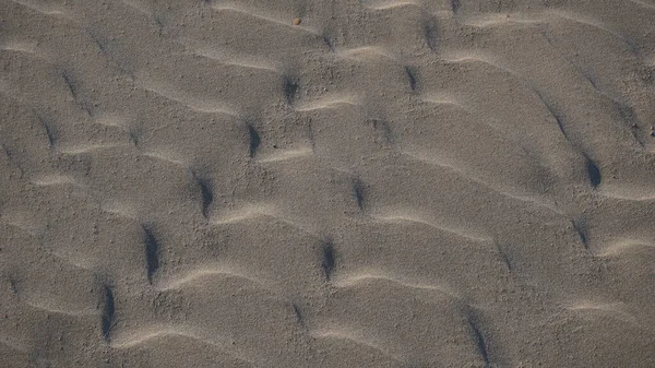 Forme Sabbia Uno Sfondo Spiaggia — Foto Stock