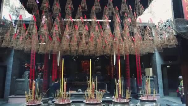 Candle smoke in a temple in Vietnam. — Stock Video