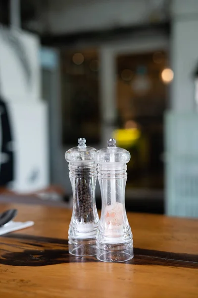 salt shaker and pepper shaker on the table