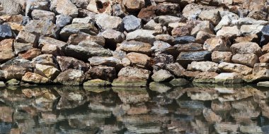 Taş duvar koruma dalgalar - sorunsuz doku arka plan