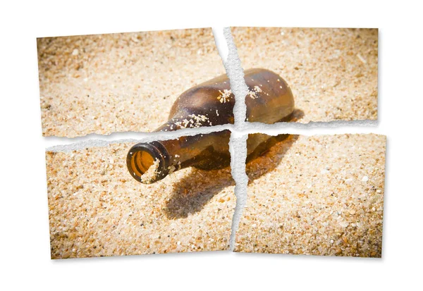 Ripped photo of a bottle of beer resting on the beach - Alcoholism and tobacco addiction concept