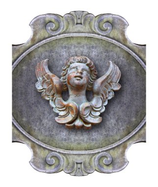 Sculpture of a wooden angel against an old classical plaster fra clipart