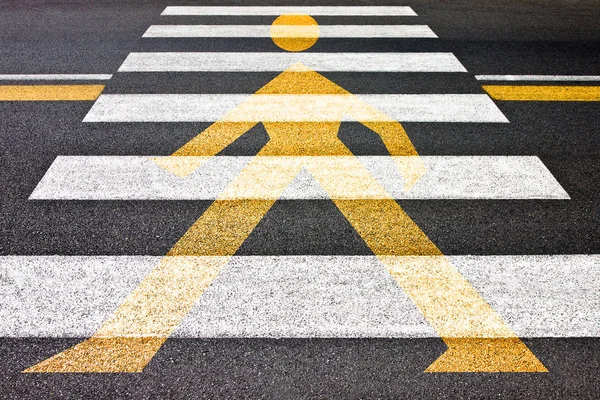 Black and white pedestrian crossing with silhouette of man on it — Stock Photo, Image