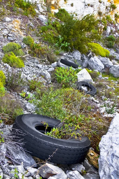 Large old tires abandoned in an illegal dump — Stock Photo, Image