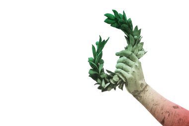 Hand holds a laurel wreath - bronze statue on italian flag backg clipart