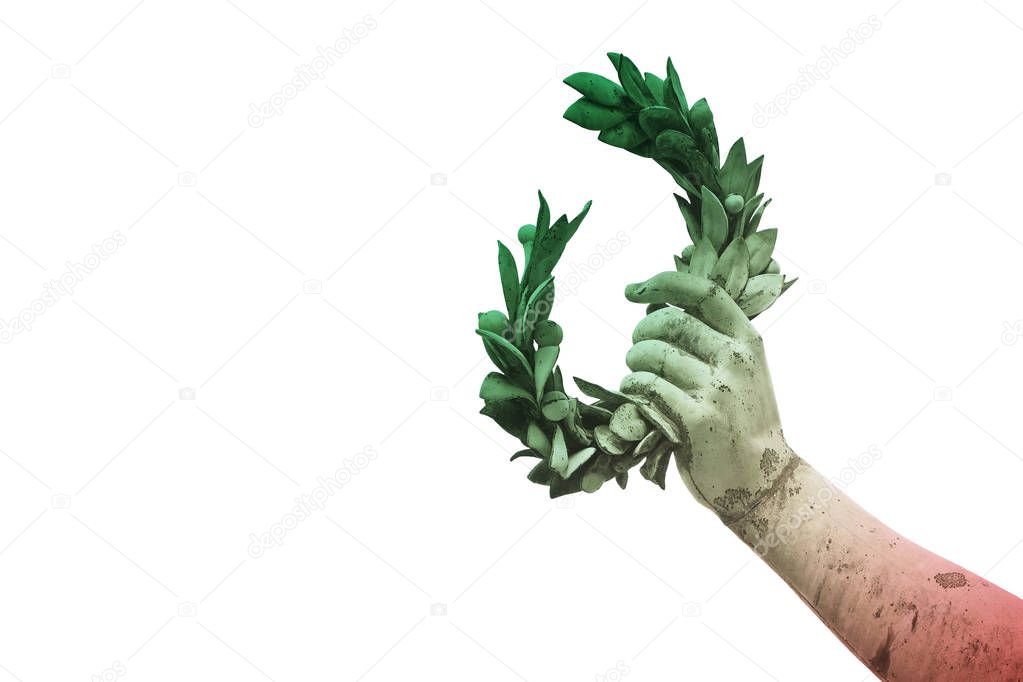 Hand holds a laurel wreath - bronze statue on italian flag backg