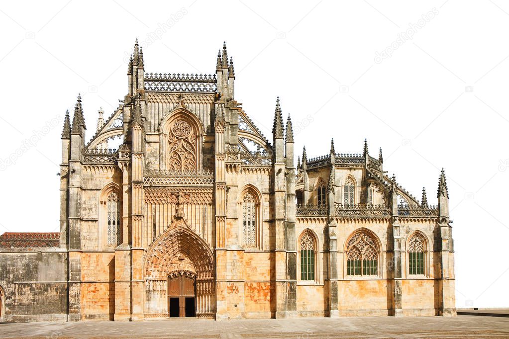 The facade of Batalha cathedral in Portugal with the ornate faca