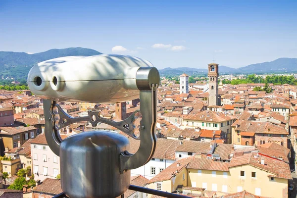 Panoramic view of Lucca seen from Guinigi tower with binocular o