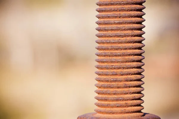Old rusty bolt with threaded metal bar - image with copy space — Stock Photo, Image