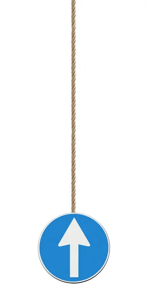 Blue arrow sign isolated on white background hanging from a rope — Stock Photo, Image