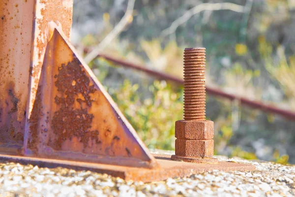Old rusty anchor bolt with iron plate - image with copy space — Stock Photo, Image