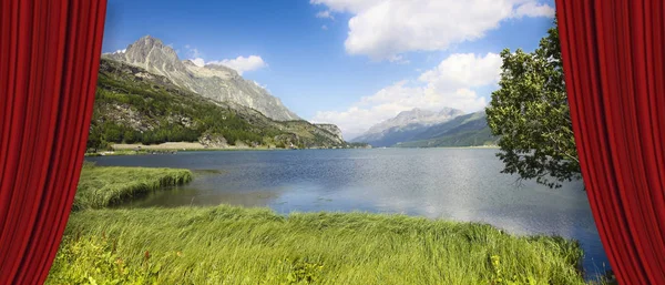 Open theater red curtains against Sils lake in the Upper Engadin — Stock Photo, Image