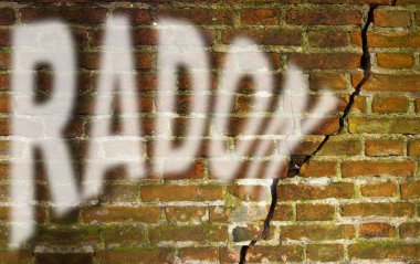 A cracked brick wall with radon gas escaping - concept image wit clipart