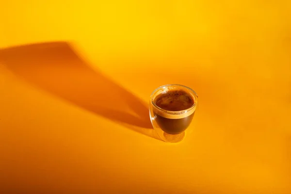 Freshly Brewed Creamy Espresso Glass Coffee Cup Isolated Yellow Background — Stock Photo, Image