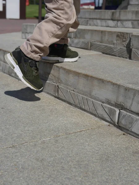 Sunlight over Legs of Person on Skateboard · Free Stock Photo