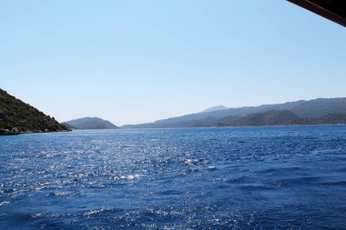 Hindi. Türk Kültürü. Türkiye 'nin manzarası ve doğası. Deniz. Güneşi. Avuçlar. Kumsal. Otel.