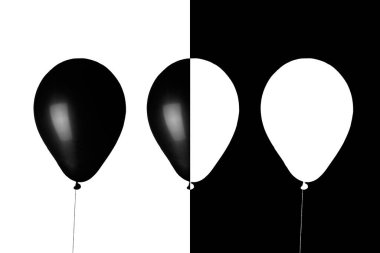 Siyah beyaz balonlarla zıt zıt zıt zıt zıt zıt zıt zıt zıt zıt zıt zıt zıt zıt zeminlerde şişirilebilir ışık.