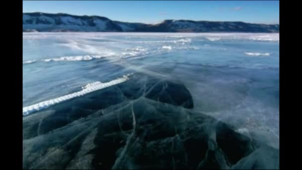 Lago Baikal Invierno Hielo Hermoso Ventisqueros Sopla Viento Hielo Espeso — Vídeo de stock