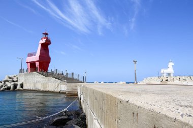 Jeju Güney Kore 'nin kuzeyindeki Iho Tewoo sahilindeki Iho Deniz Feneri.