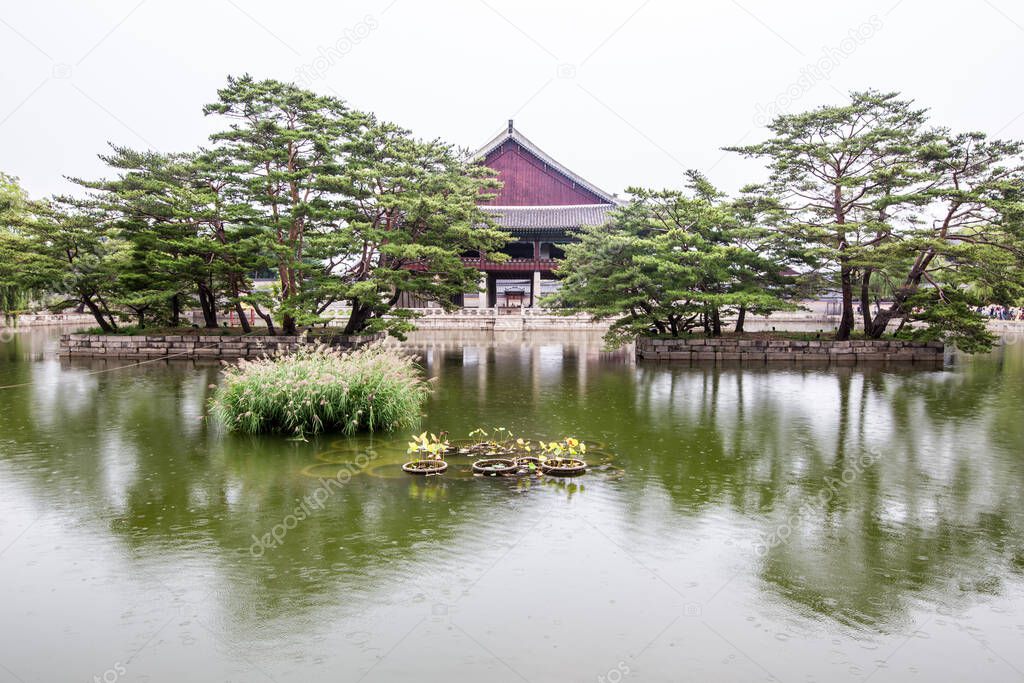 Historical building on lake at Gyeongbokgung Palace in Seoul South Korea Asia