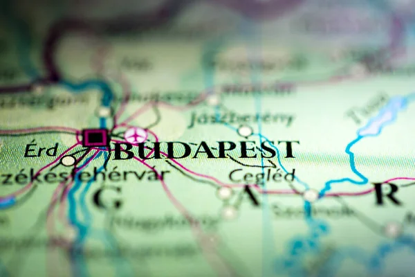 Shallow depth of field focus on geographical map location of Budapest city Hungary Europe continent on atlas