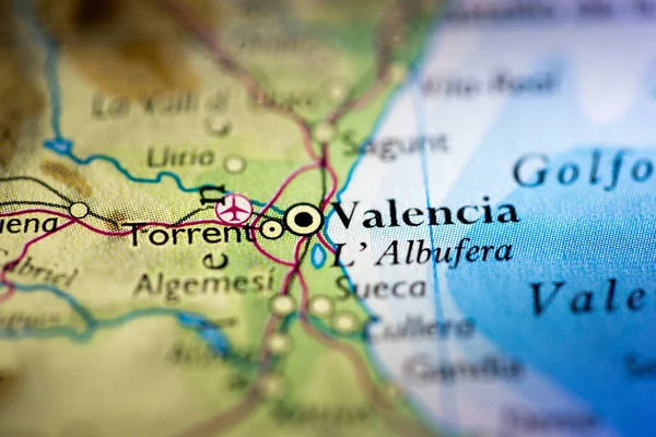 Shallow depth of field focus on geographical map location of Valencia city Spain Mediterranean Europe continent on atlas