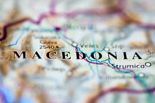 Shallow depth of field focus on geographical map location of Macedonia Europe continent on atlas