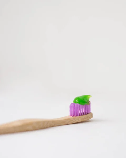 Pink Bamboo Toothbrush Green Toothpaste — Stock Photo, Image